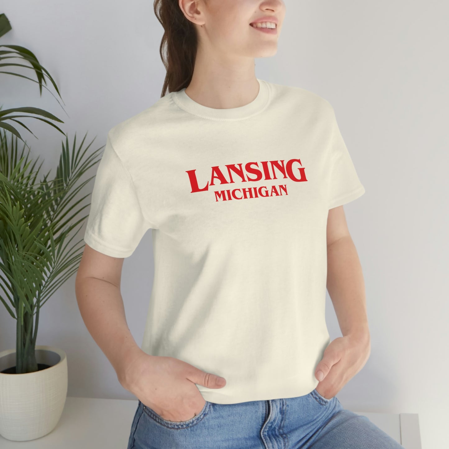 'Lansing Michigan' ' T-Shirt (1980s Drama Parody) | Unisex Standard Fit