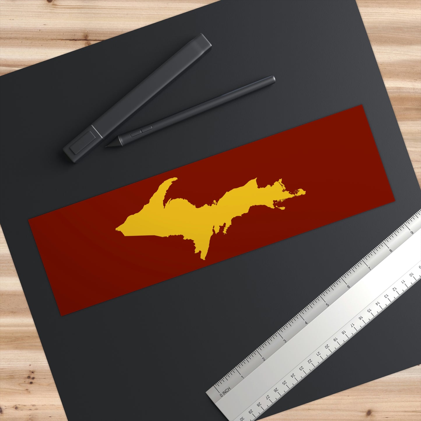 Michigan Upper Peninsula Bumper Sticker (w/ Gold UP Outline) | Traverse Cherry Red Background