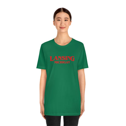 'Lansing Michigan' ' T-Shirt (1980s Drama Parody) | Unisex Standard Fit