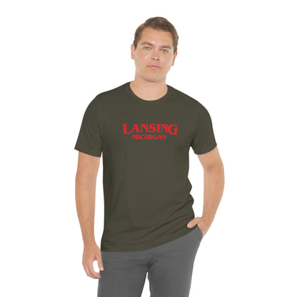 'Lansing Michigan' ' T-Shirt (1980s Drama Parody) | Unisex Standard Fit