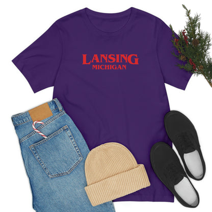 'Lansing Michigan' ' T-Shirt (1980s Drama Parody) | Unisex Standard Fit