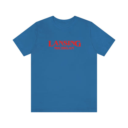 'Lansing Michigan' ' T-Shirt (1980s Drama Parody) | Unisex Standard Fit