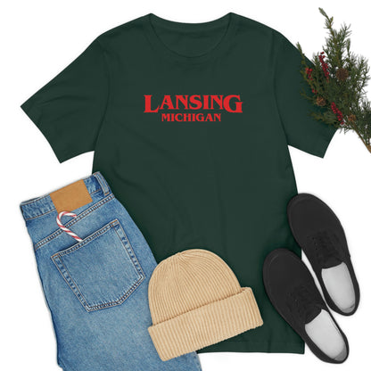 'Lansing Michigan' ' T-Shirt (1980s Drama Parody) | Unisex Standard Fit