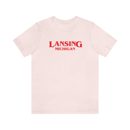 'Lansing Michigan' ' T-Shirt (1980s Drama Parody) | Unisex Standard Fit