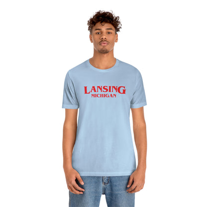 'Lansing Michigan' ' T-Shirt (1980s Drama Parody) | Unisex Standard Fit