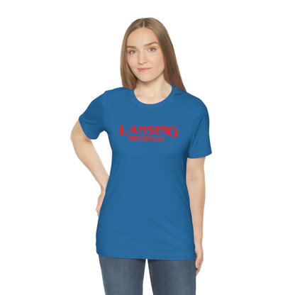 'Lansing Michigan' ' T-Shirt (1980s Drama Parody) | Unisex Standard Fit