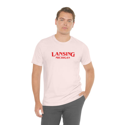 'Lansing Michigan' ' T-Shirt (1980s Drama Parody) | Unisex Standard Fit