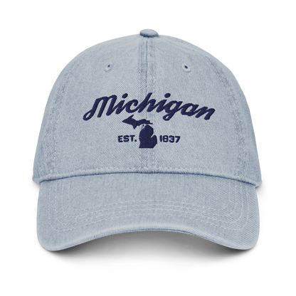 'Michigan EST 1837' Denim Baseball Cap (Script Font) | White/Navy Embroidery