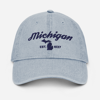 'Michigan EST 1837' Denim Baseball Cap (Script Font) | White/Navy Embroidery