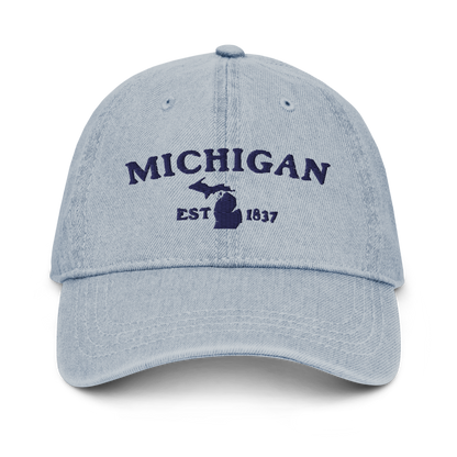 'Michigan EST 1837' Denim Baseball Cap (Woodcut Font) | White/Navy Embroidery