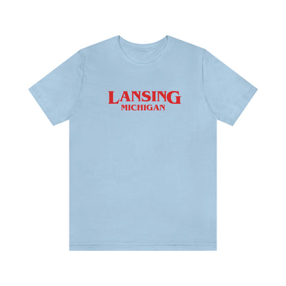 'Lansing Michigan' ' T-Shirt (1980s Drama Parody) | Unisex Standard Fit