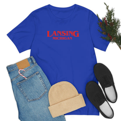 'Lansing Michigan' ' T-Shirt (1980s Drama Parody) | Unisex Standard Fit