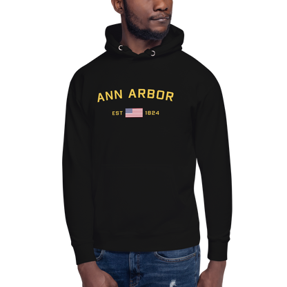 'Ann Arbor EST 1824' Unisex Premium Hoodie (Gold Type w/USA Flag Outline)