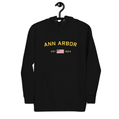 'Ann Arbor EST 1824' Unisex Premium Hoodie (Gold Type w/USA Flag Outline)