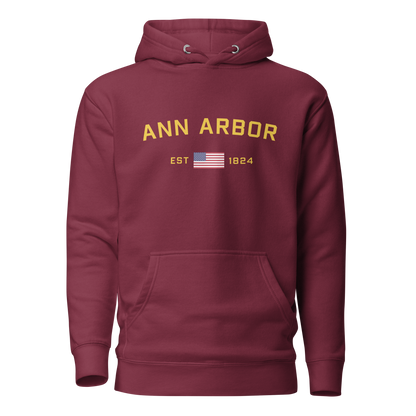 'Ann Arbor EST 1824' Unisex Premium Hoodie (Gold Type w/USA Flag Outline)