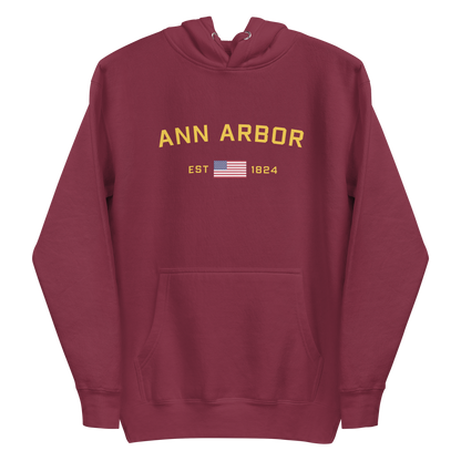 'Ann Arbor EST 1824' Unisex Premium Hoodie (Gold Type w/USA Flag Outline)