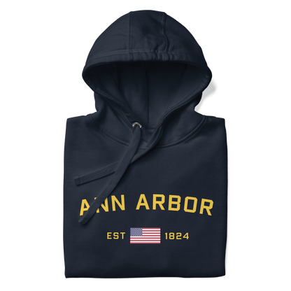 'Ann Arbor EST 1824' Unisex Premium Hoodie (Gold Type w/USA Flag Outline)