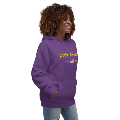 'Ann Arbor EST 1824' Unisex Premium Hoodie (Gold Type w/USA Flag Outline)